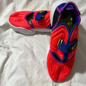 Nike Women’s Bright Red and Royal Blue Slip-On Sneakers with Neon Yellow Accents